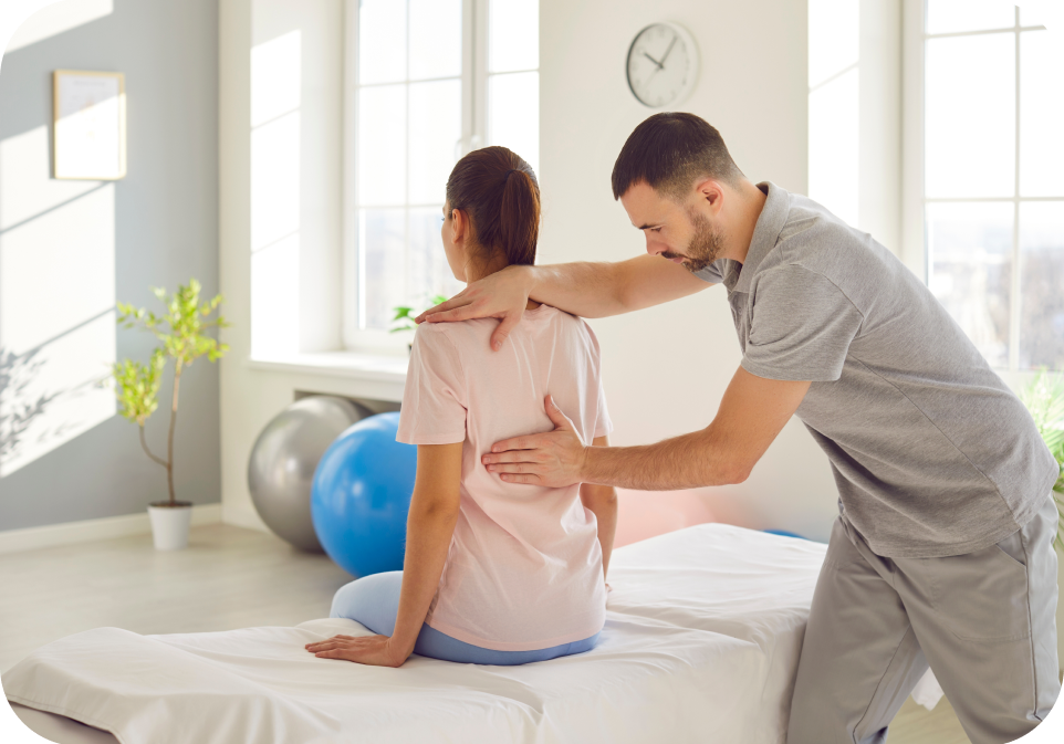 Physical therapist assessing woman's back posture for bone health in a bright clinic.