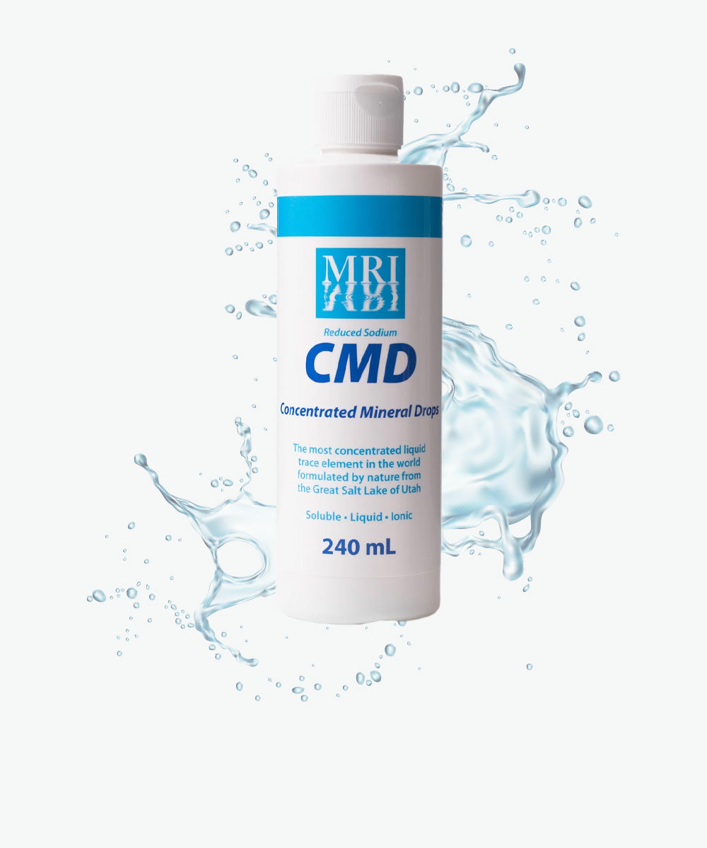 CMD Concentrated Mineral Drops 240ml bottle with water splash background