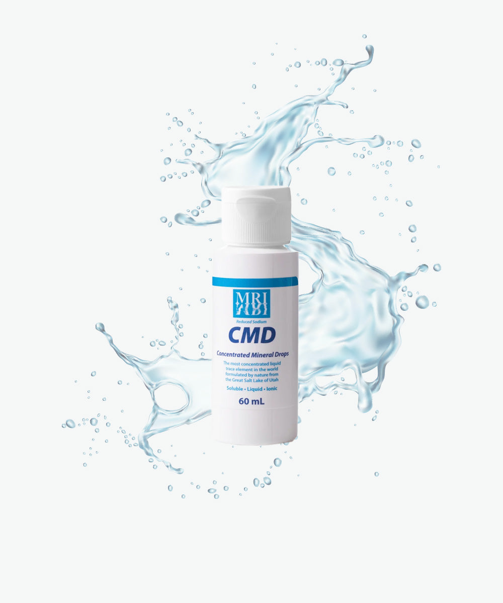 CMD bottle with water splash on a white background