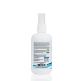 White spray bottle with label on a white background